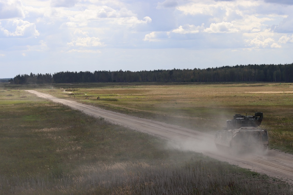 Soldiers stationed at Bemowo Piskie Training Area qualify during M2 Bradley Fighting Vehicle Gunnery Table IV