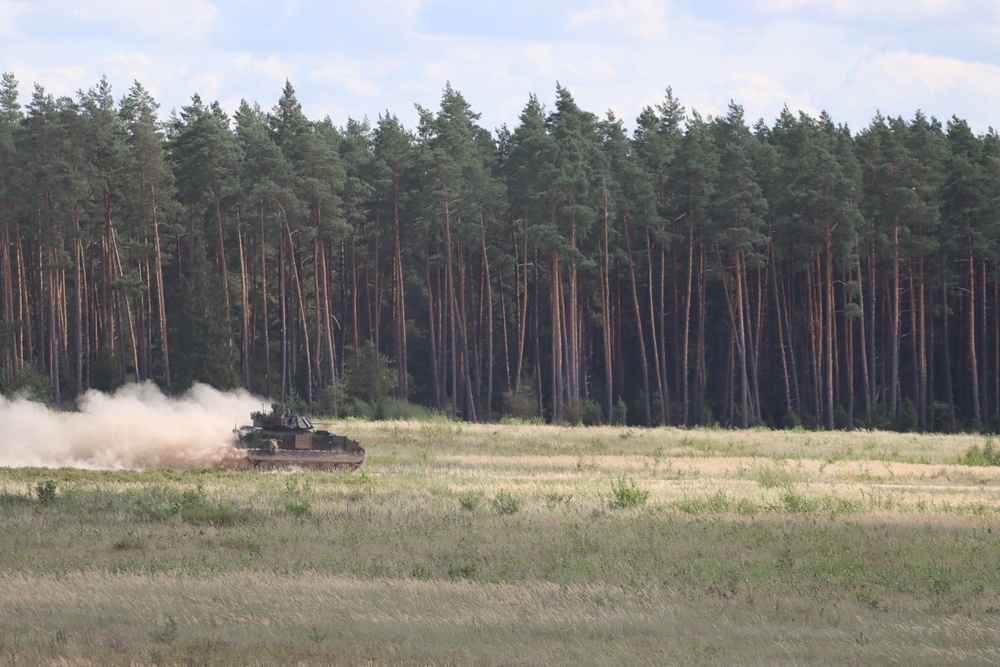 Soldiers stationed at Bemowo Piskie Training Area qualify during M2 Bradley Fighting Vehicle Gunnery Table IV