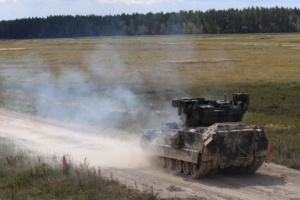 Soldiers stationed at Bemowo Piskie Training Area qualify during M2 Bradley Fighting Vehicle Gunnery Table IV