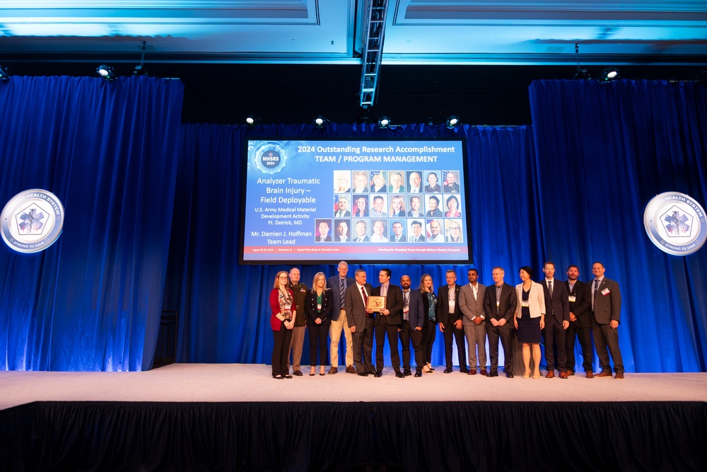 USAMMDA Brain Health team takes Program Management award during MHSRS