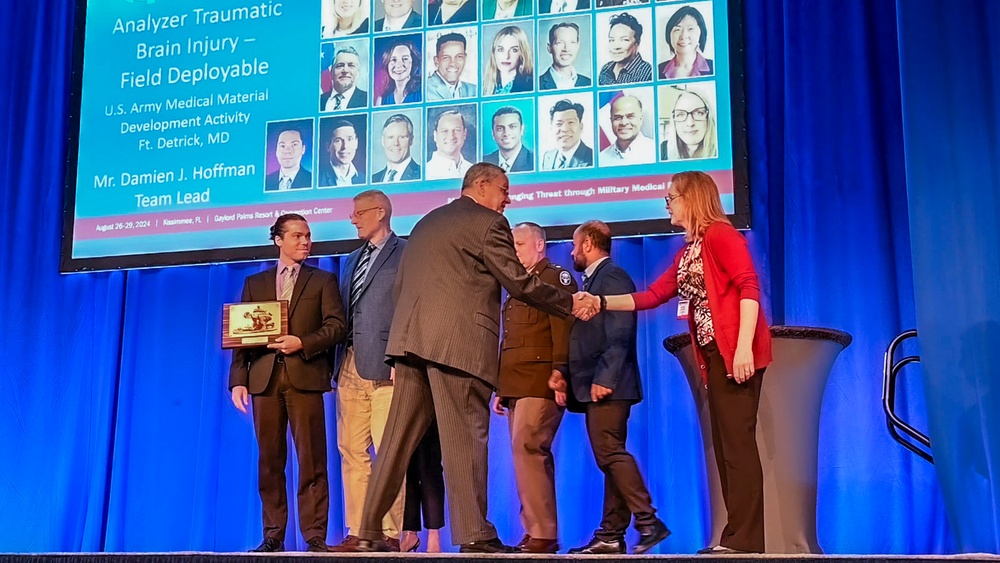 USAMMDA Brain Health team takes Program Management award during MHSRS