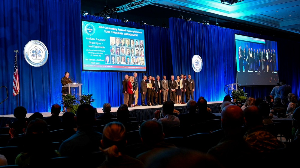 USAMMDA Brain Health team takes Program Management award during MHSRS