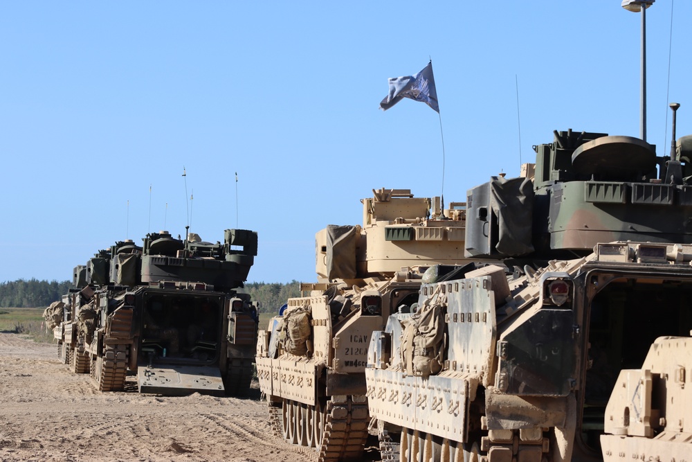 Soldiers stationed at Bemowo Piskie Training Area qualify during M2 Bradley Fighting Vehicle Gunnery Table IV