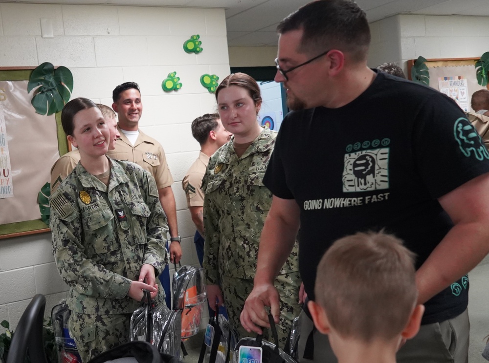 NWS Yorktown sailors support Back to School event at Greenwood Elementary School with free backpacks and school supplies