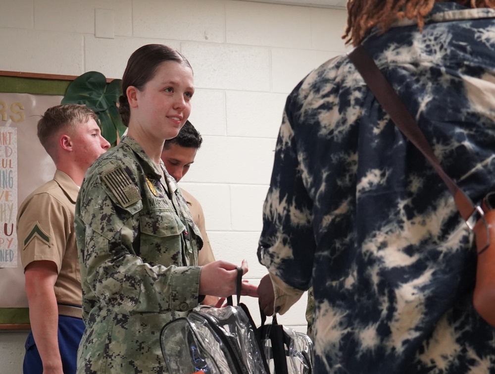 NWS Yorktown sailors support Back to School event at Greenwood Elementary School with free backpacks and school supplies