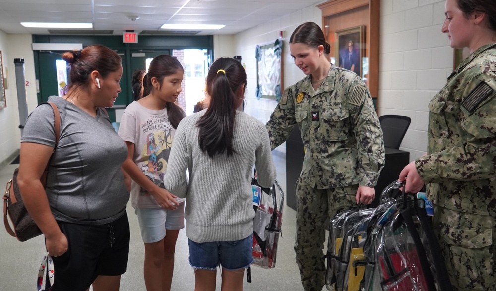 NWS Yorktown sailors support Back to School event at Greenwood Elementary School with free backpacks and school supplies