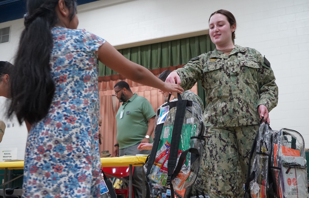 NWS Yorktown sailors support Back to School event at Greenwood Elementary School with free backpacks and school supplies