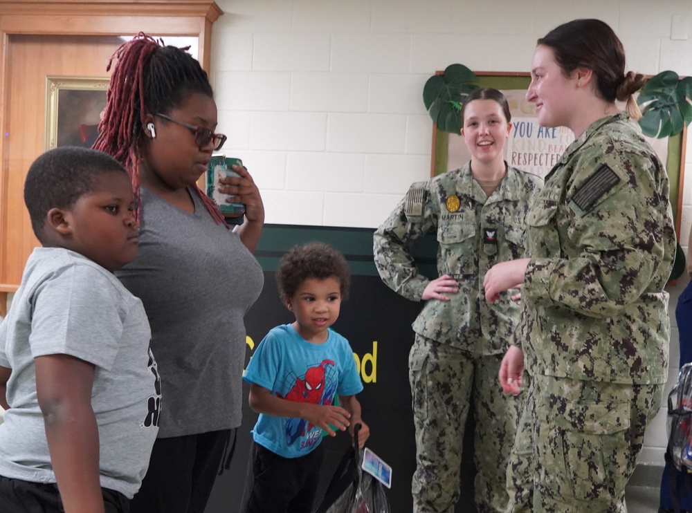 NWS Yorktown sailors support Back to School event at Greenwood Elementary School with free backpacks and school supplies