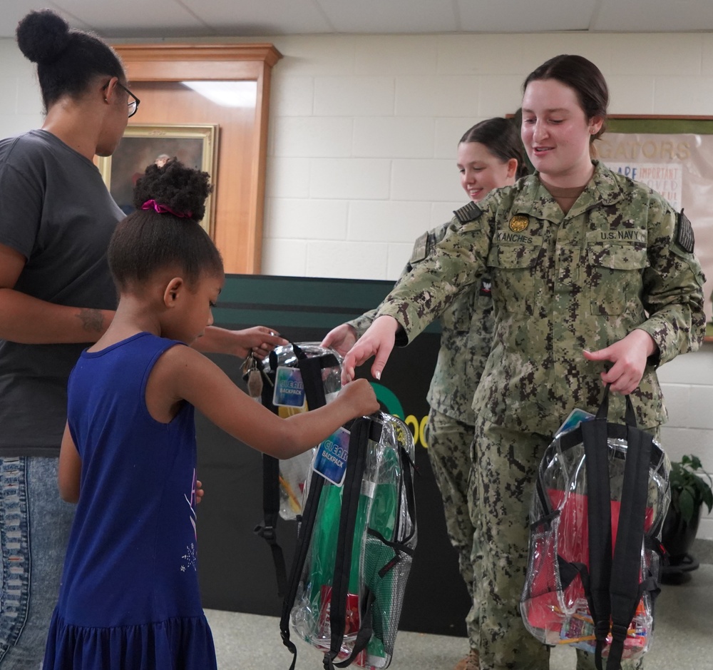 NWS Yorktown sailors support Back to School event at Greenwood Elementary School with free backpacks and school supplies