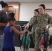 NWS Yorktown sailors support Back to School event at Greenwood Elementary School with free backpacks and school supplies