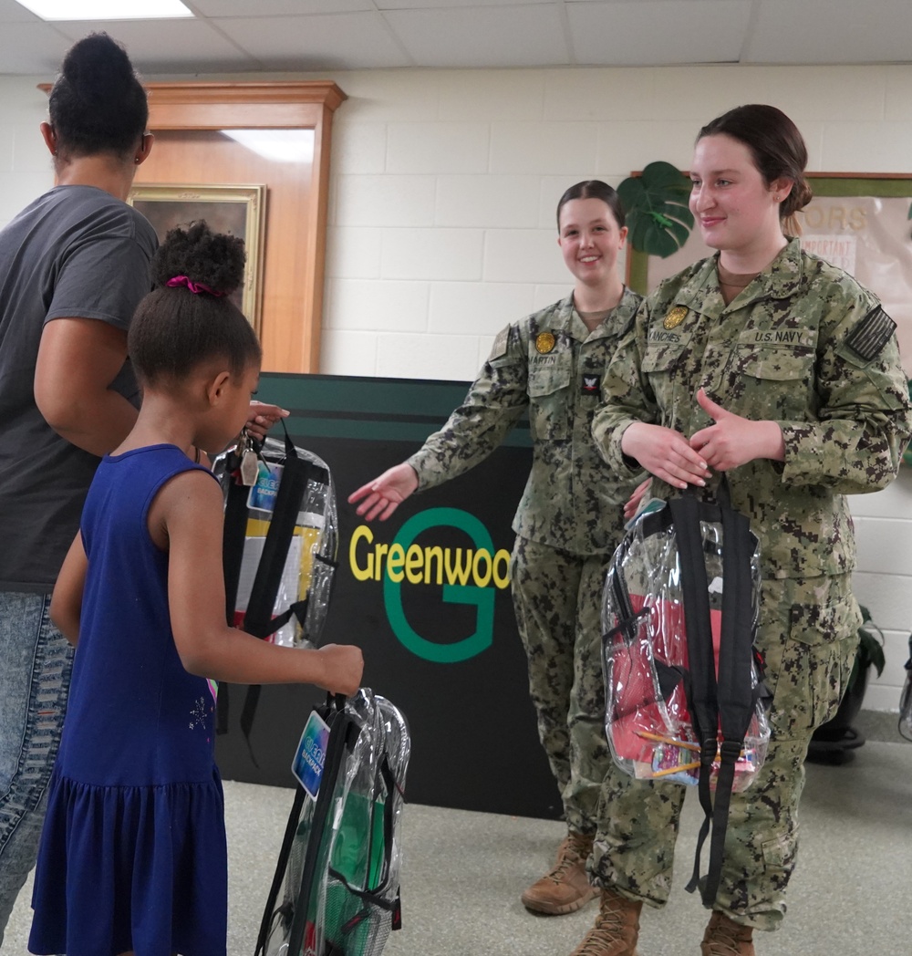 NWS Yorktown sailors support Back to School event at Greenwood Elementary School with free backpacks and school supplies