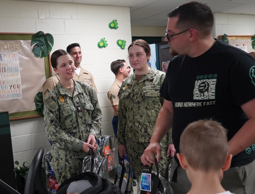 NWS Yorktown sailors support Back to School event at Greenwood Elementary School with free backpacks and school supplies