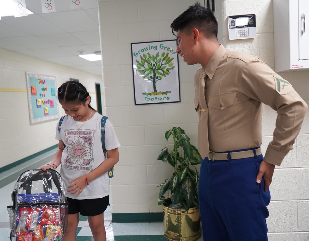 Marines from the Marine Corps Security Force Regiment support Back to School event in Newport News, Virginia