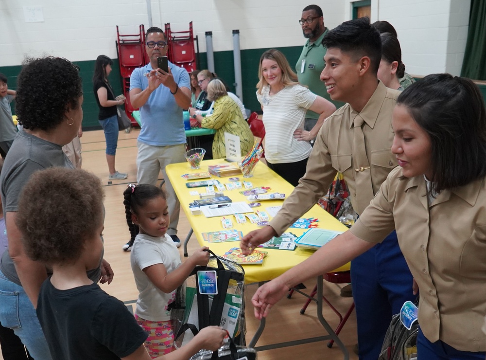 Marines from the Marine Corps Security Force Regiment support Back to School event in Newport News, Virginia