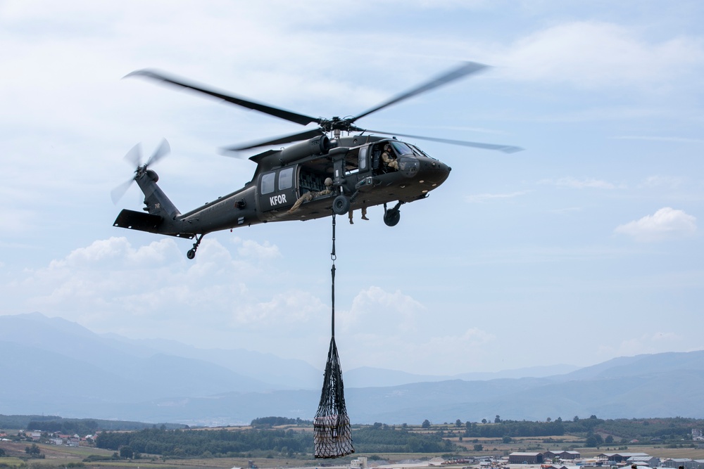 U.S. Army Soldiers conduct sling load training at Camp Bondsteel Kosovo.