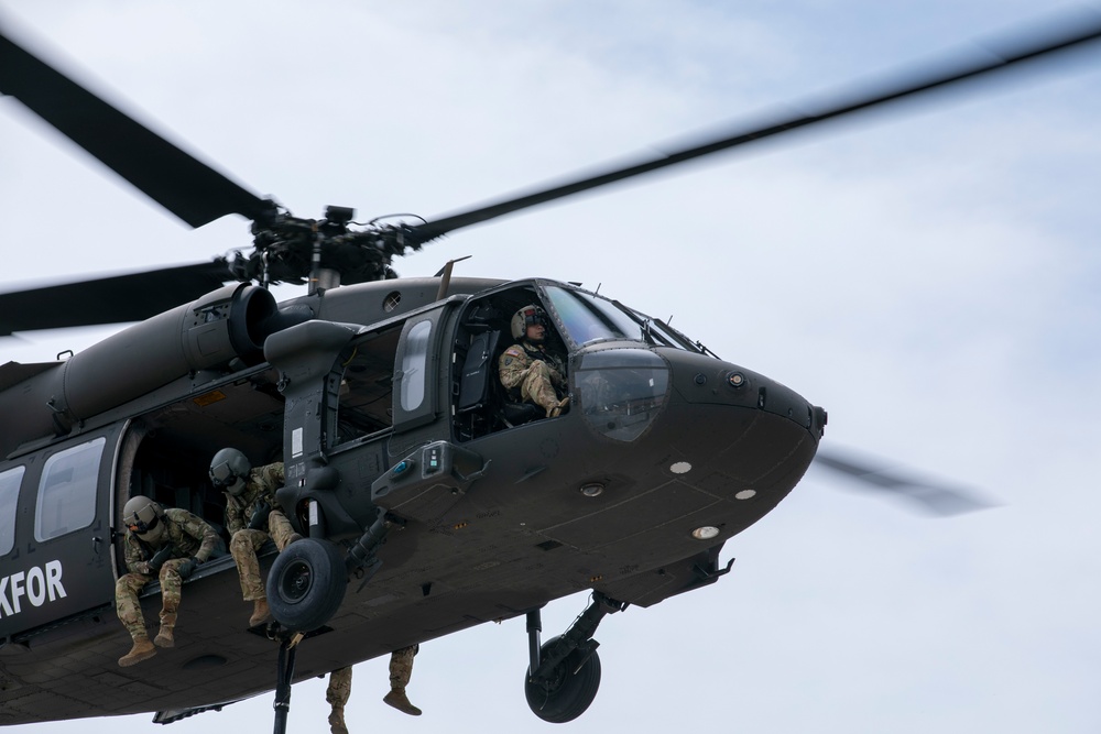 U.S. Army Soldiers conduct sling load training at Camp Bondsteel Kosovo.