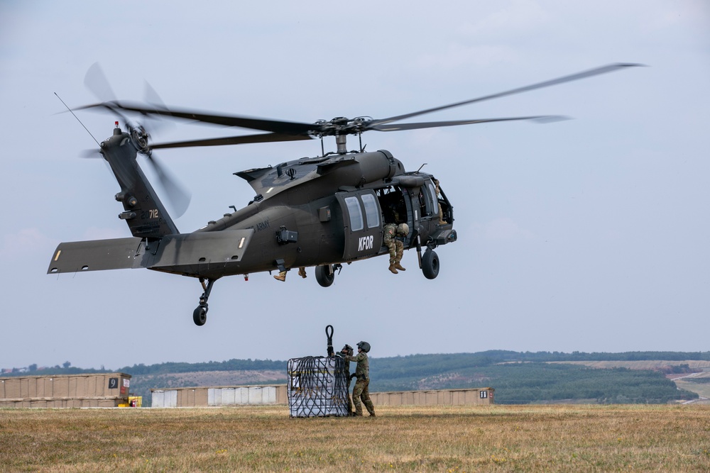 U.S. Army Soldiers conduct sling load training at Camp Bondsteel Kosovo.