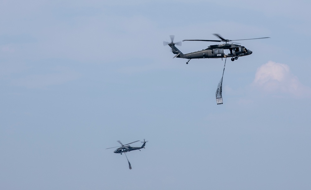 U.S. Army Soldiers conduct sling load training at Camp Bondsteel Kosovo.