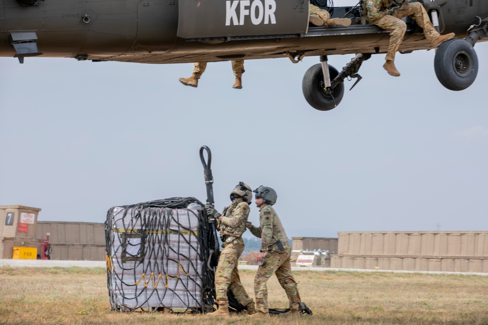 U.S. Army Soldiers conduct sling load training at Camp Bondsteel Kosovo.