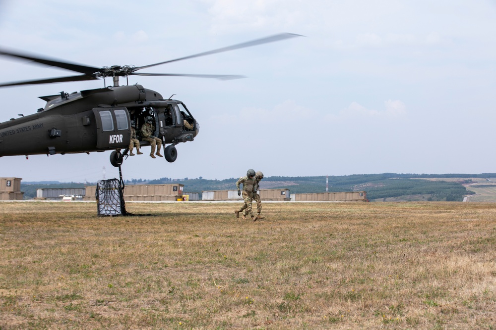 U.S. Army Soldiers conduct sling load training at Camp Bondsteel Kosovo.