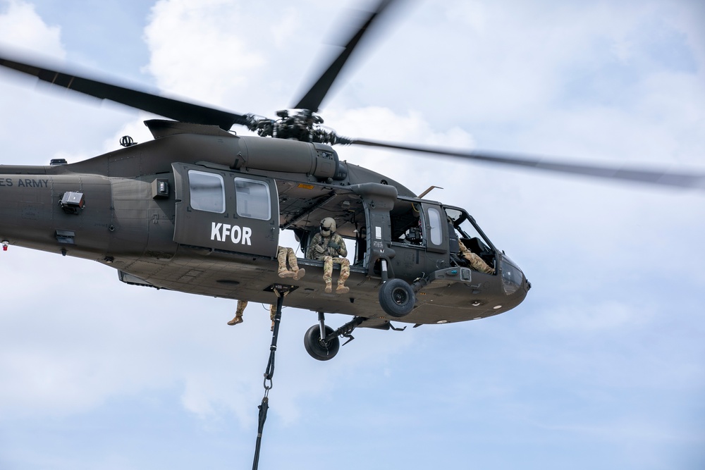 U.S. Army Soldiers conduct sling load training at Camp Bondsteel Kosovo.