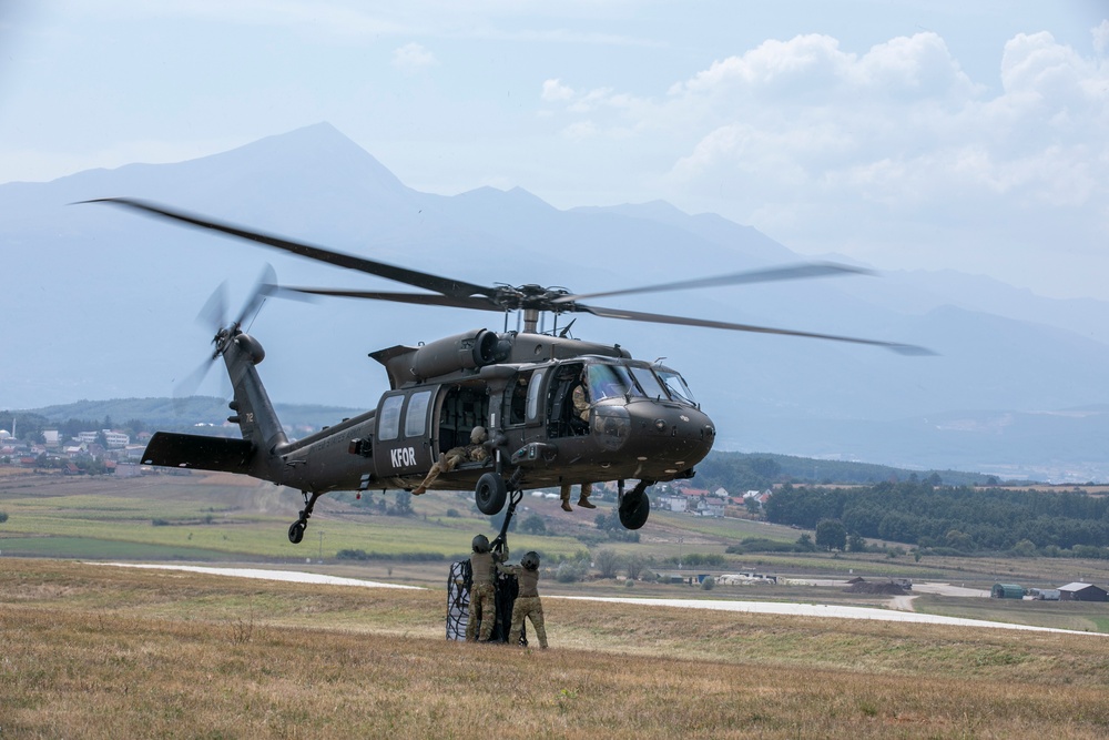 U.S. Army Soldiers conduct sling load training at Camp Bondsteel Kosovo.