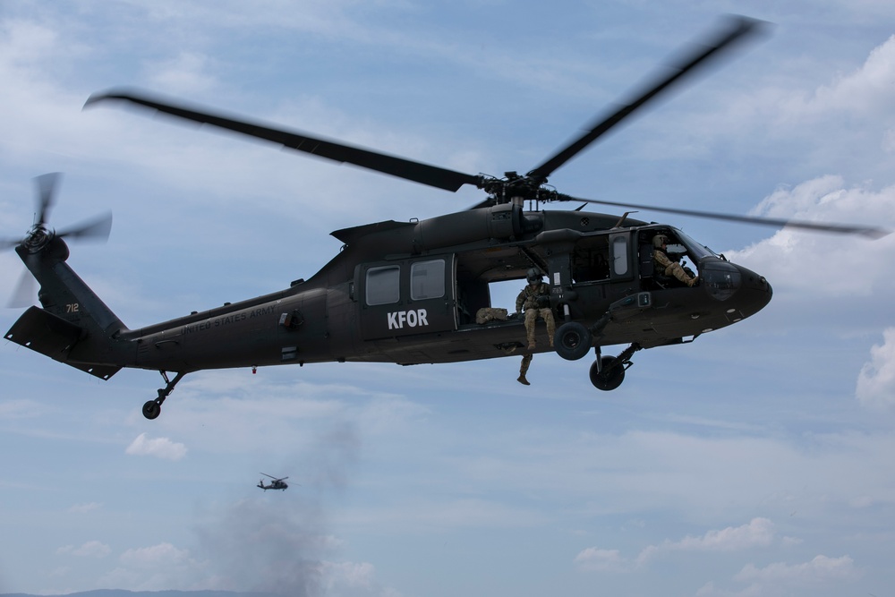 U.S. Army Soldiers conduct sling load training at Camp Bondsteel Kosovo.