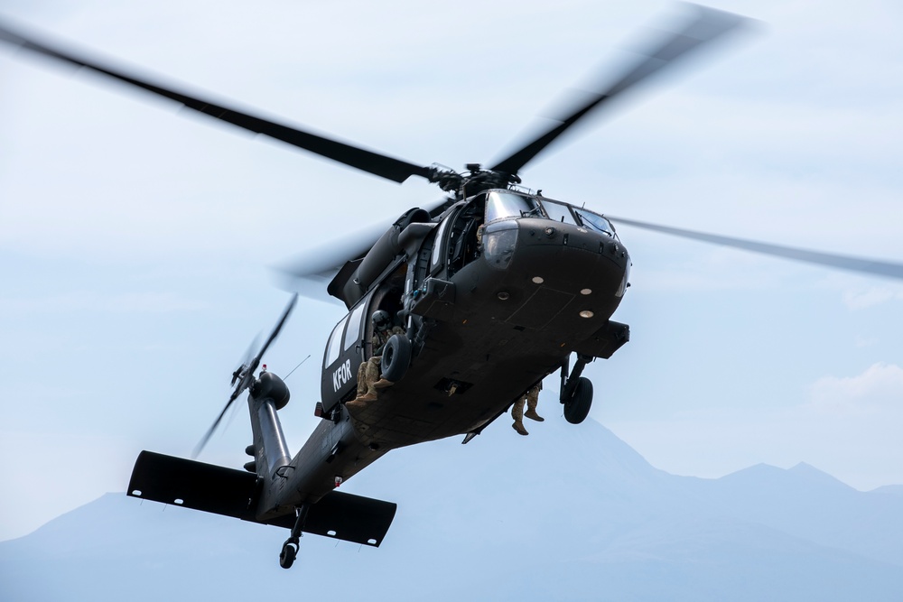 U.S. Army Soldiers conduct sling load training at Camp Bondsteel Kosovo.