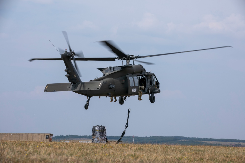 U.S. Army Soldiers conduct sling load training at Camp Bondsteel Kosovo.