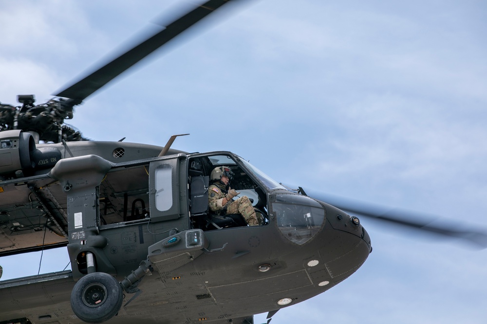 U.S. Army Soldiers conduct sling load training at Camp Bondsteel Kosovo.