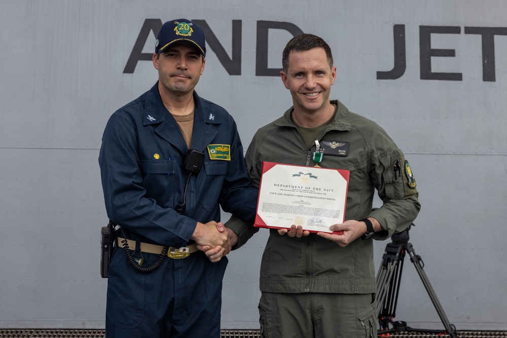USS Green Bay presents Navy and Marine Corps Commendation Medals