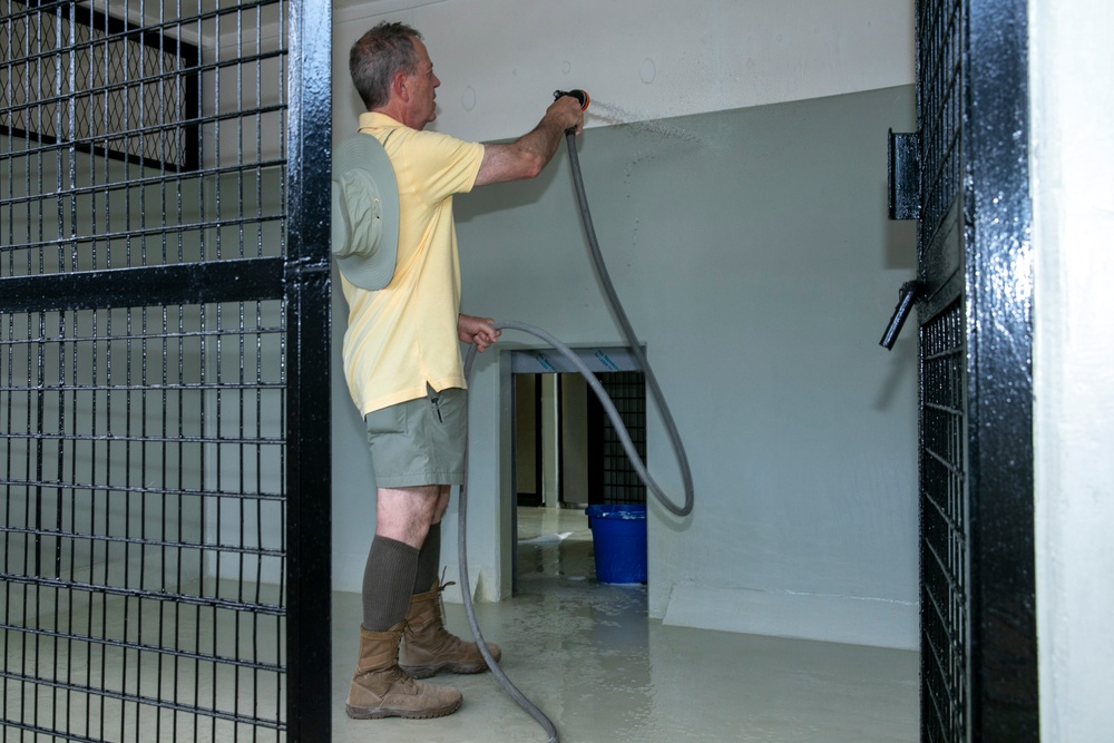 48th IBCT soldiers assigned to Regional Command East of the NATO-led KFOR mission volunteered to assist with cleaning the kennels of military working dogs at Camp Bondsteel, Kosovo, July 20, 2024.