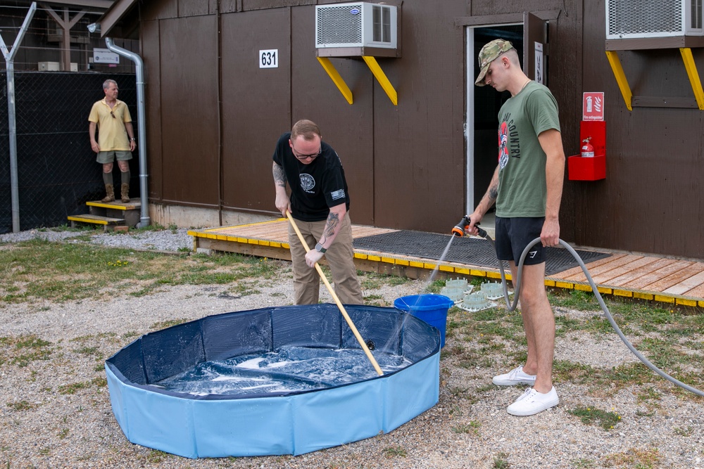 48th IBCT soldiers assigned to Regional Command East of the NATO-led KFOR mission volunteered to assist with cleaning the kennels of military working dogs at Camp Bondsteel, Kosovo, July 20, 2024.