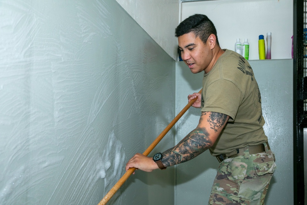 48th IBCT soldiers assigned to Regional Command East of the NATO-led KFOR mission volunteered to assist with cleaning the kennels of military working dogs at Camp Bondsteel, Kosovo, July 20, 2024.