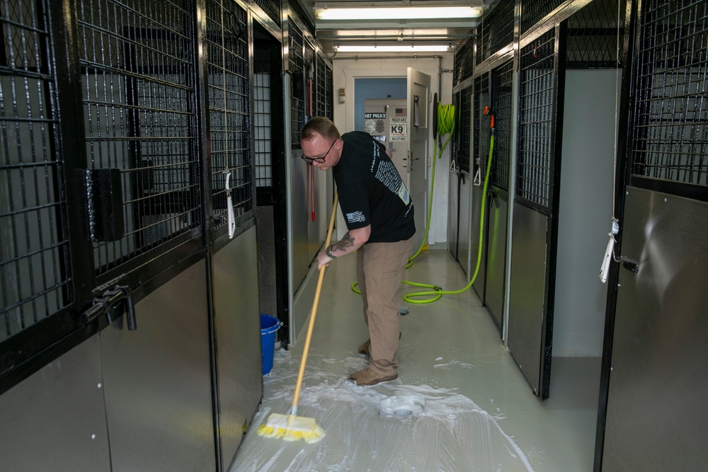 48th IBCT soldiers assigned to Regional Command East of the NATO-led KFOR mission volunteered to assist with cleaning the kennels of military working dogs at Camp Bondsteel, Kosovo, July 20, 2024.