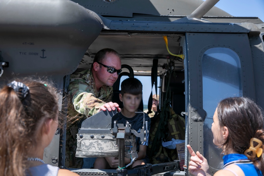 U.S. Soldiers from Regional Command East of the NATO-led KFOR mission hosted students and teachers from Future School at Camp Bondsteel, Kosovo, July 12, 2024.