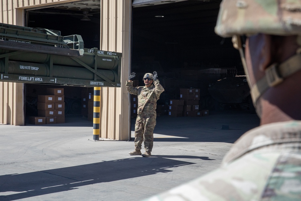 U.S. Soldiers prepare the HIMARS operating vehicle for simulated training during Southern Fenix 24