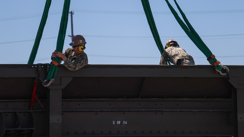 NMCB 4 Seabees Assemble Rock Breaker