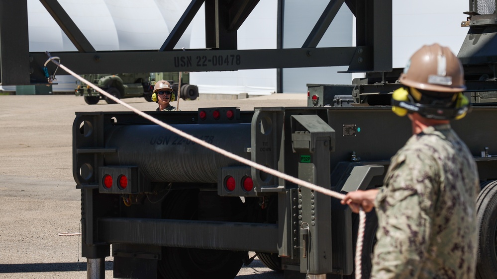 NMCB 4 Seabees Assemble Rock Breaker