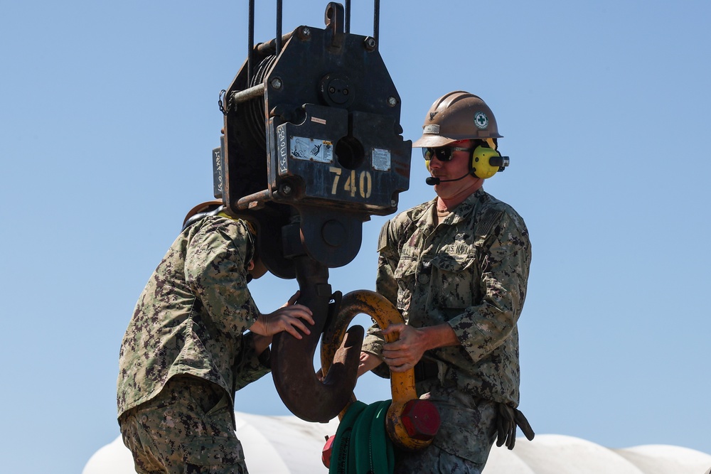 NMCB 4 Seabees Assemble Rock Breaker