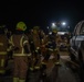 379th ECES firefighters practice vehicle extrication with host nation partners