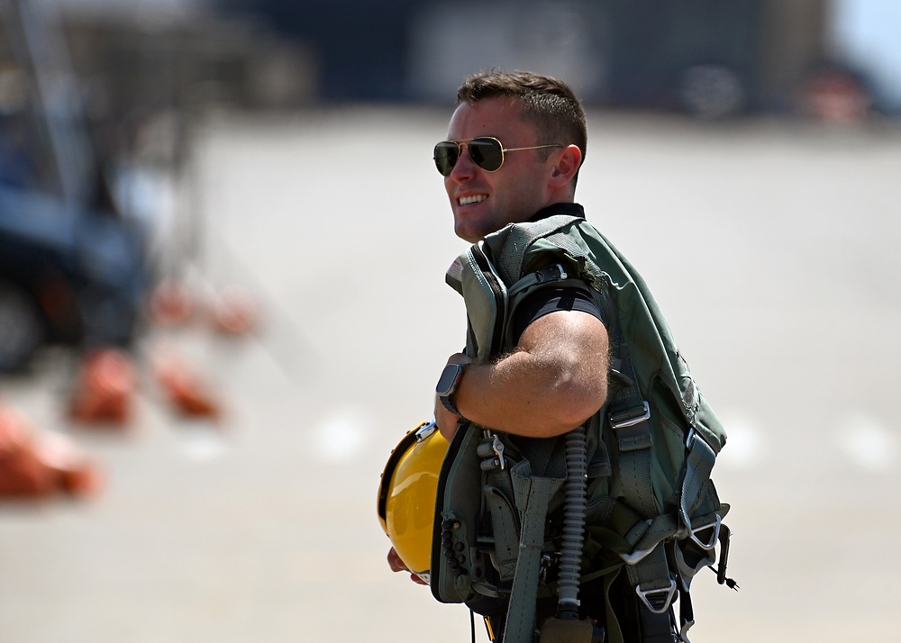 The U.S. Navy Flight Demonstration Team, the Blue Angels perform in Wichita, Kansas at the Frontiers In Flight Air Show.