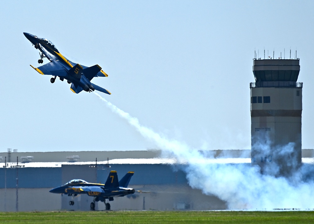 The U.S. Navy Flight Demonstration Team, the Blue Angels perform in Wichita, Kansas at the Frontiers In Flight Air Show.