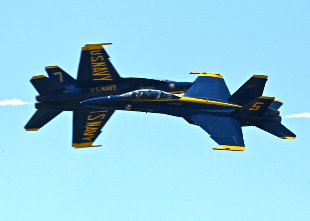 The U.S. Navy Flight Demonstration Team, the Blue Angels perform in Wichita, Kansas at the Frontiers In Flight Air Show.