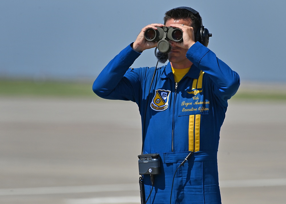 The U.S. Navy Flight Demonstration Team, the Blue Angels perform in Wichita, Kansas at the Frontiers In Flight Air Show.