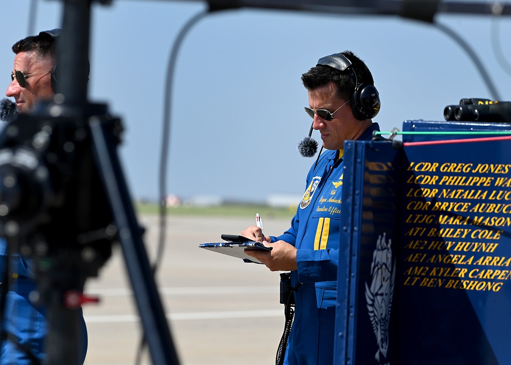 The U.S. Navy Flight Demonstration Team, the Blue Angels perform in Wichita, Kansas at the Frontiers In Flight Air Show.