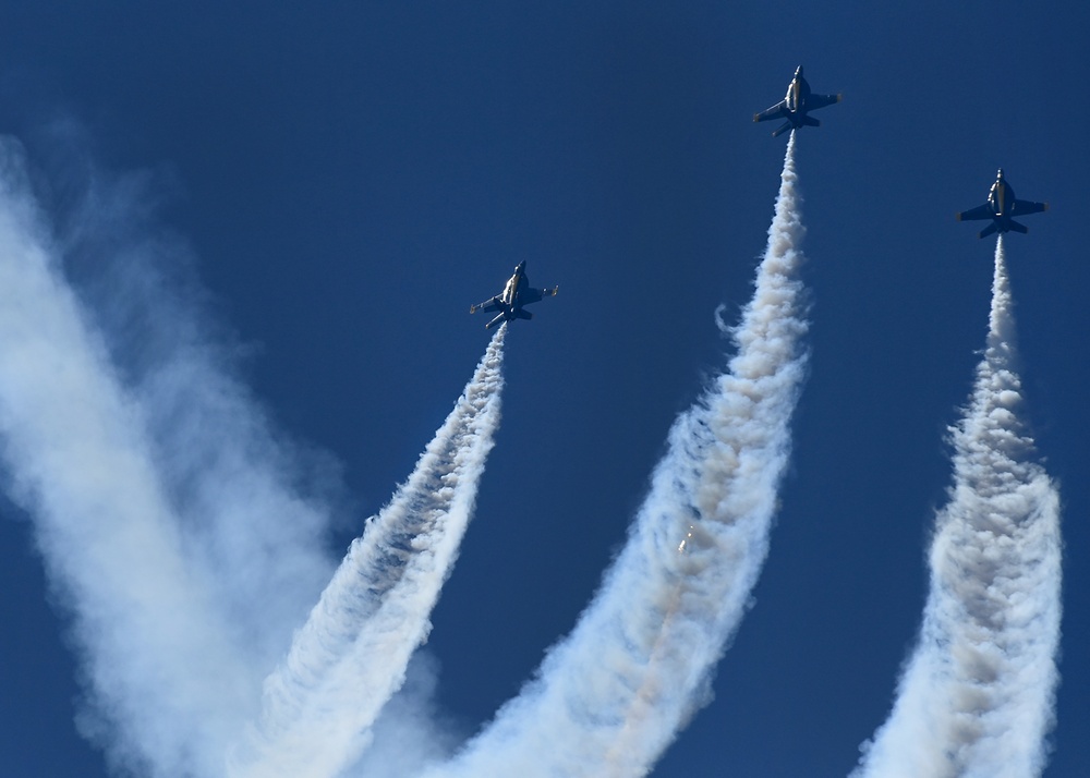 The U.S. Navy Flight Demonstration Team, the Blue Angels perform in Wichita, Kansas at the Frontiers In Flight Air Show.