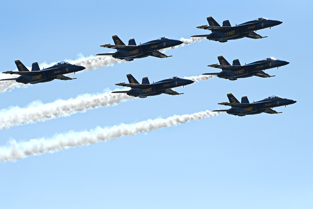 The U.S. Navy Flight Demonstration Team, the Blue Angels, perform in Wichita, Kansas at the Frontiers In Flight Air Show. (U.S. Navy photo by Chief Mass Communication Specialist Michael Russell/Released)