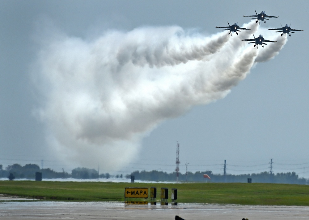 The U.S. Navy Flight Demonstration Team, the Blue Angels, perform in Wichita, Kansas at the Frontiers In Flight Air Show. (U.S. Navy photo by Chief Mass Communication Specialist Michael Russell/Released)