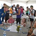 The U.S. Navy Flight Demonstration Team, the Blue Angels, perform in Wichita, Kansas at the Frontiers In Flight Air Show.